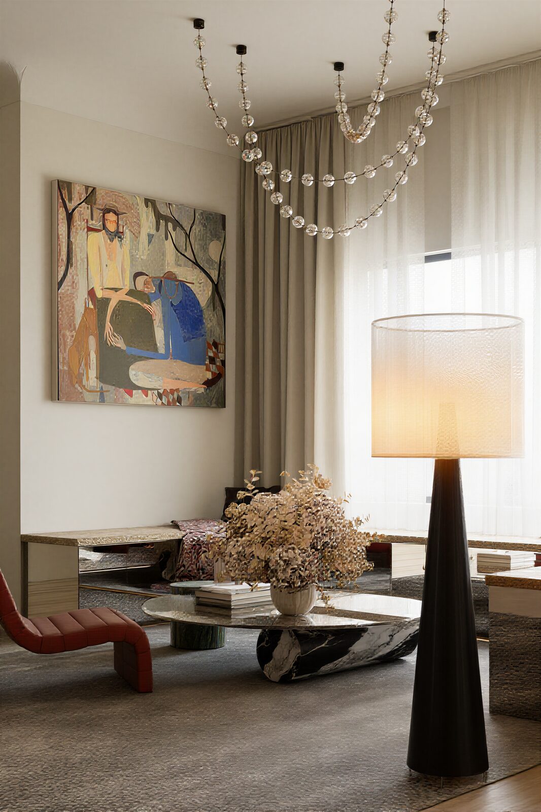 Living room detail with artwork and crystal chandelier