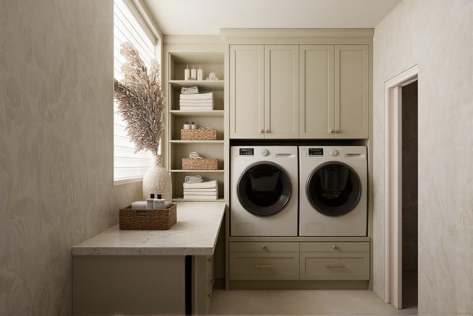 Laundry room with elegant cabinetry and marble countertop